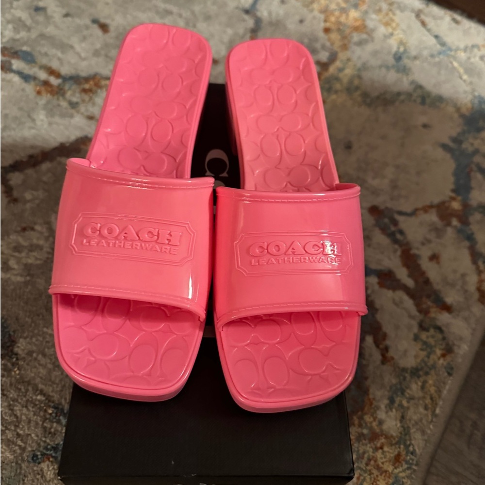 New with box Coach Scarlett Rubber slip-ons in Petunia Pink. Size 9